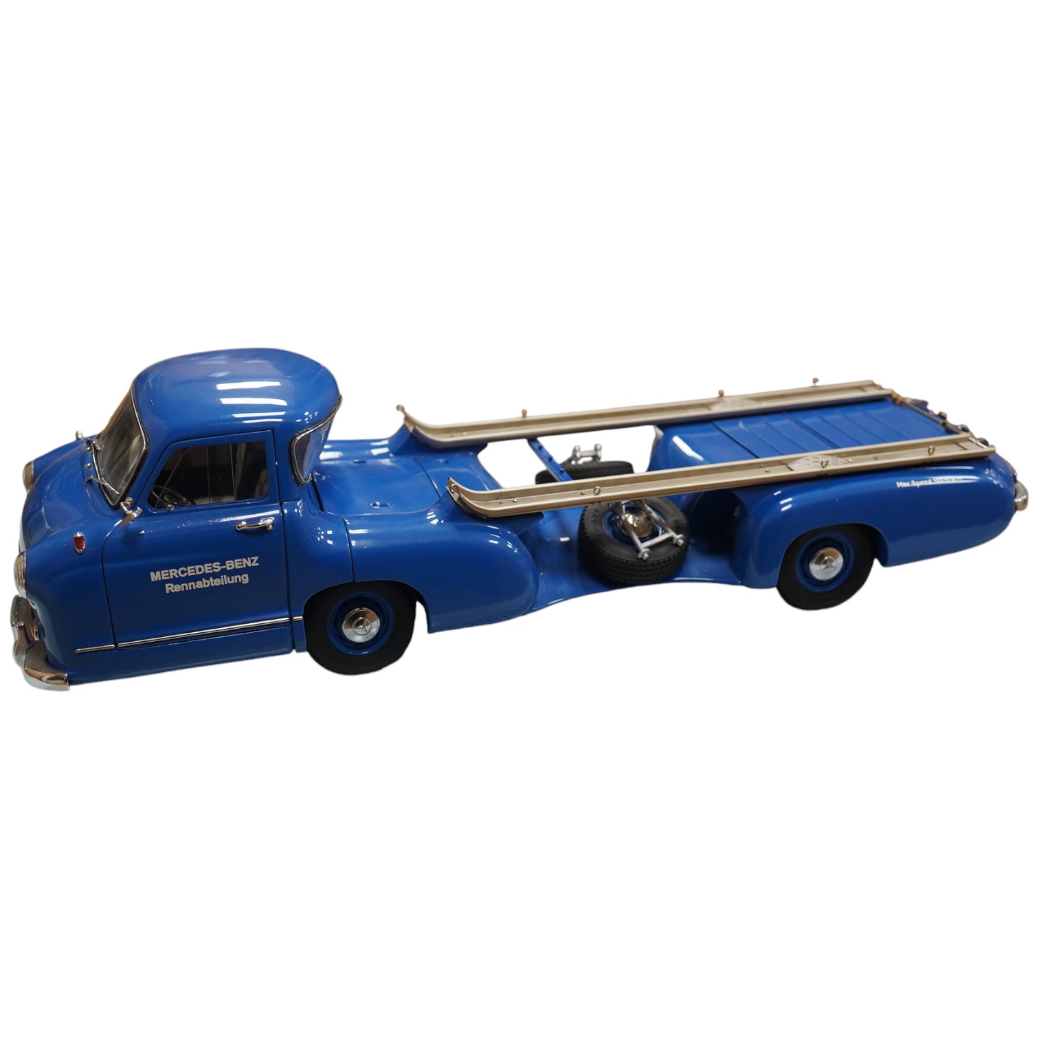 A boxed CMC 1:18 scale diecast model of a Mercedes-Benz 1954 racing car transporter. Condition - good.